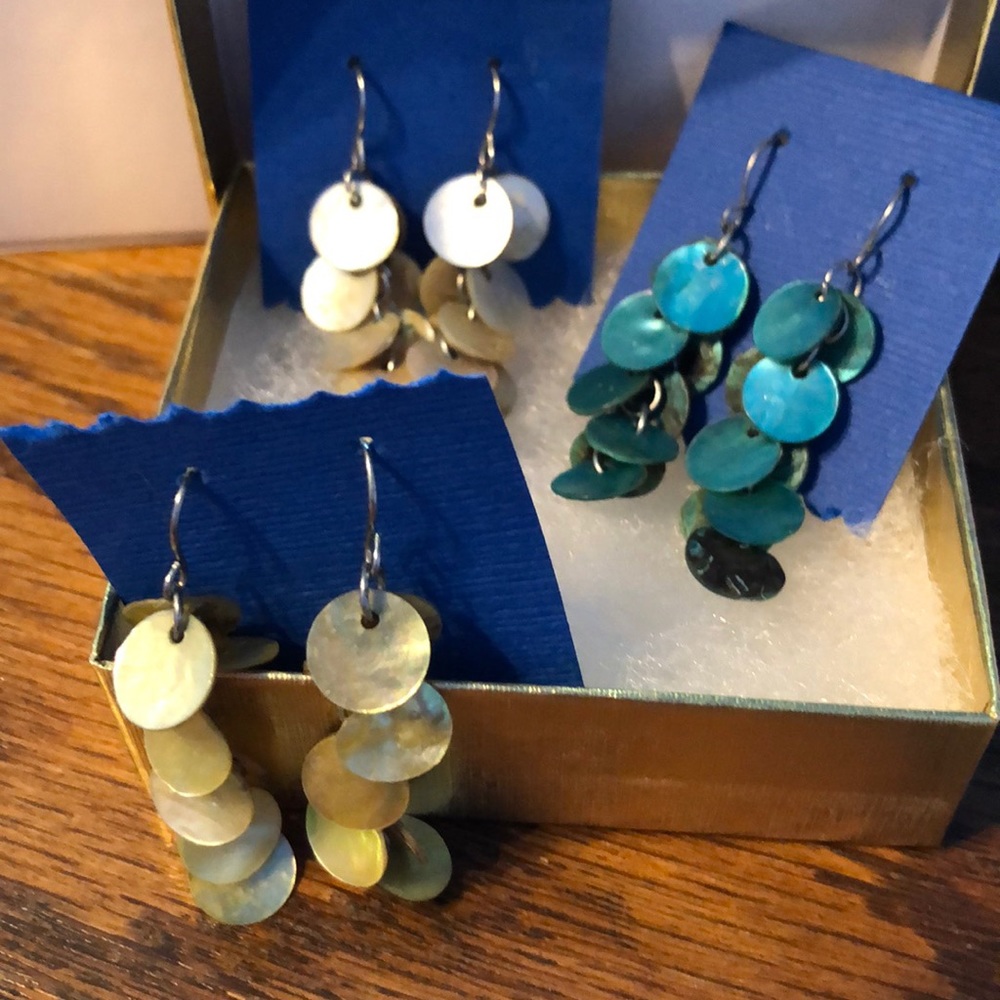 A set of 3 pearlized stone dangle earrings